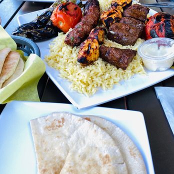 The Diplomat Junior - Combo for 2 with Chicken, Beef and Lule Kabobs on rice with roasted tomatoes and Anaheim Chilies. - Mediterranean Near Me - Glendora, California