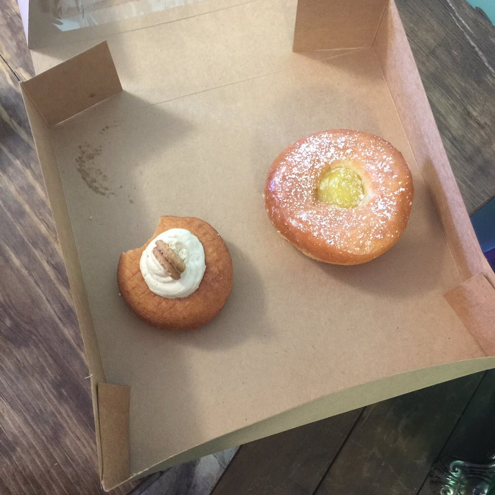 Twisted & Glazed - A peanut butter doughnut with a bite taken out of it and a lemon filled doughnut - Acai Bowls Near Me - Paso Robles, California Twisted & Glazed - A peanut butter doughnut with a bite taken out of it and a lemon filled doughnut - Acai Bowls Near Me - Paso Robles, California