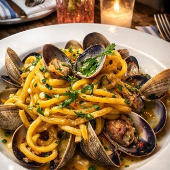 DOC Wine Bar - linguine with fresh clams sautéed with garlic, olive oil, herbs, and a touch of spice. - Sardinian Near Me - Brooklyn, New York DOC Wine Bar - linguine with fresh clams sautéed with garlic, olive oil, herbs, and a touch of spice. - Sardinian Near Me - Brooklyn, New York