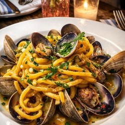 DOC Wine Bar - Linguine with fresh clams sautéed with garlic, olive oil, herbs, and a touch of spice.