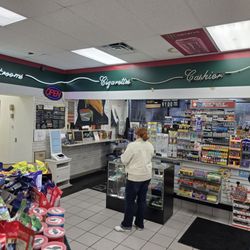 El Sazon Tacos & More - El Sazon is that covered window next to the OPEN sign