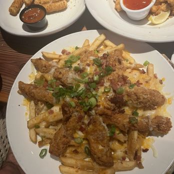 Miller's Ale House - MOZZARELLA STICKS - 8 COUNT FRIED CALAMARI - Sports Bars Near Me - Boynton Beach, Florida Miller's Ale House - MOZZARELLA STICKS - 8 COUNT FRIED CALAMARI - Sports Bars Near Me - Boynton Beach, Florida