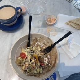 Gyro meat omelette with latte. Gyro meat omelette with latte.