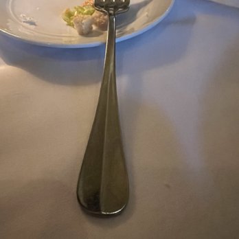 Mitchell's Steakhouse - Dirty fork-also scratched-propped up so you can see it - Steakhouses Near Me - Columbus, Ohio Mitchell's Steakhouse - Dirty fork-also scratched-propped up so you can see it - Steakhouses Near Me - Columbus, Ohio