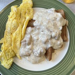 Mary's Cafe - Sausage gravy over wheat with scrambled eggs