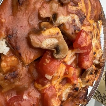 KLN Café - a pizza with mushrooms and tomatoes - Hong Kong Style Cafe Near Me - Markham, Ontario KLN Café - a pizza with mushrooms and tomatoes - Hong Kong Style Cafe Near Me - Markham, Ontario