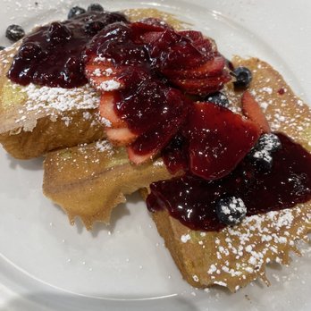 Peach Valley Cafè - Stuffed French toast topped with seasonal berries - Breakfast & Brunch Near Me - Gainesville, Florida