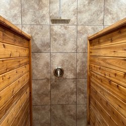 Cedar Creek Resort & RV Park - Our clean RV park bathhouse offers toilets and showers to guests. Additionally, we offer laundry and a soda machine.