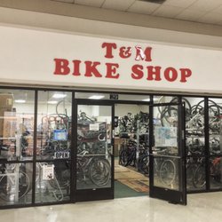 T & M Bike Shop - The front of the shop - there's a lot of bikes in there! Which makes sense because, well, it's a bike shop.