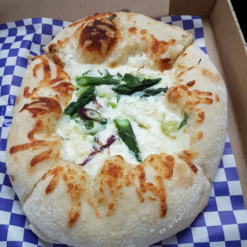 The Wheel Oakley - Asparagus & spring onion on a burrata cheese and hand tossed dough - Italian Near Me - Cincinnati, Ohio