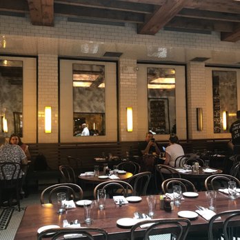 The Smith - view of the inner section with big ceiling windows - New American Near Me - New York, New York The Smith - view of the inner section with big ceiling windows - New American Near Me - New York, New York
