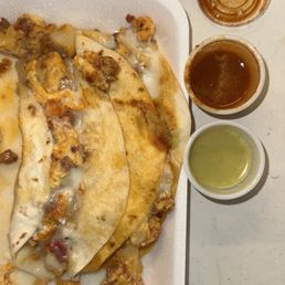 Potato egg cheese and chorizo breakfast tacos were delicious. Both the red and green salsas were great and actually spicy 10/10 Potato egg cheese and chorizo breakfast tacos were delicious. Both the red and green salsas were great and actually spicy 10/10