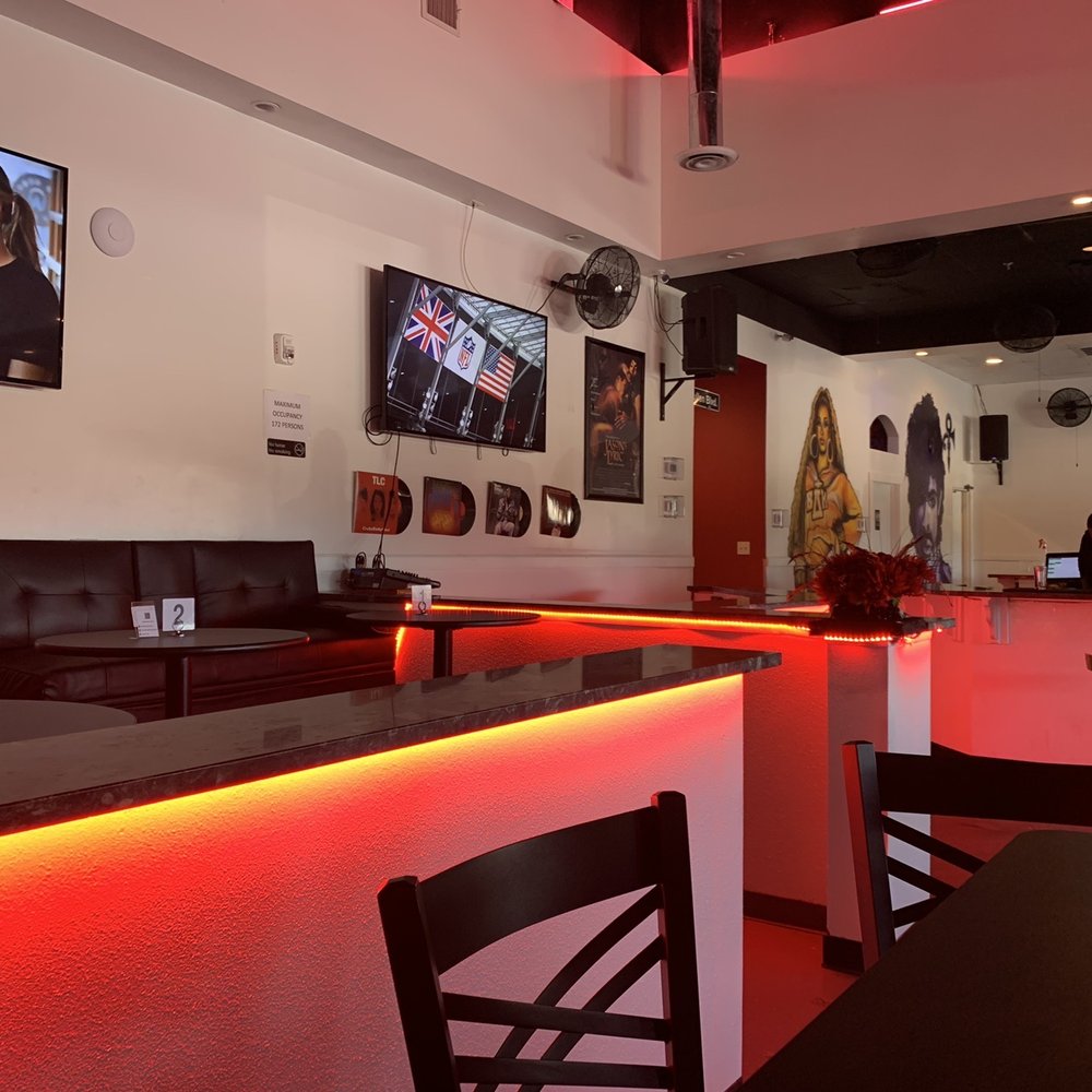 Daiq’s - a bar with red lighting - Sports Bars Near Me - Houston, Texas
