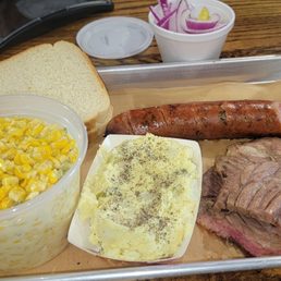 Brisket, sausage, corn, tater salad.