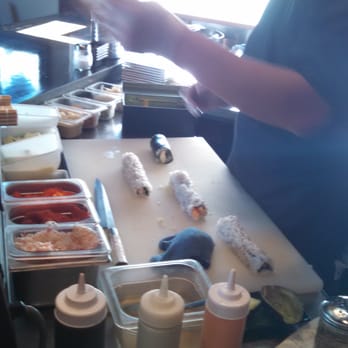 Blue Ocean - The chef making our masterpiece of sushi. - Cocktail Bars Near Me - St. Louis, Missouri
