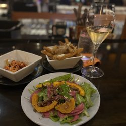 The Foundry Restaurant - Poutine, mixed green salad, and lobster