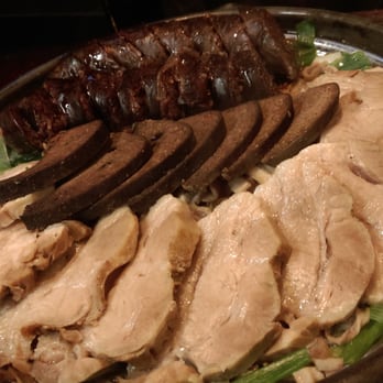 Tosokchon - Meudem Soondae. It has blood sausage, pig lungs, different kinds of meat, and intestines. Comes out on a hot grill on fire. - Korean Near Me - Annandale, Virginia Tosokchon - Meudem Soondae. It has blood sausage, pig lungs, different kinds of meat, and intestines. Comes out on a hot grill on fire. - Korean Near Me - Annandale, Virginia