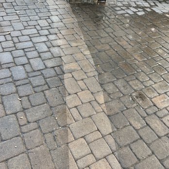 Waldner Services - a cobblestone sidewalk with a black gate - Pressure Washers Near Me Waldner Services - a cobblestone sidewalk with a black gate - Pressure Washers Near Me