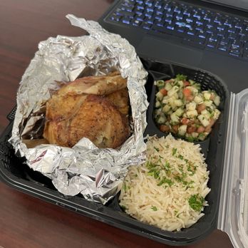 The Charcoal Restaurant - Half chicken with basmati rice and cucumber salad - Mediterranean Near Me - Louisville, Kentucky The Charcoal Restaurant - Half chicken with basmati rice and cucumber salad - Mediterranean Near Me - Louisville, Kentucky