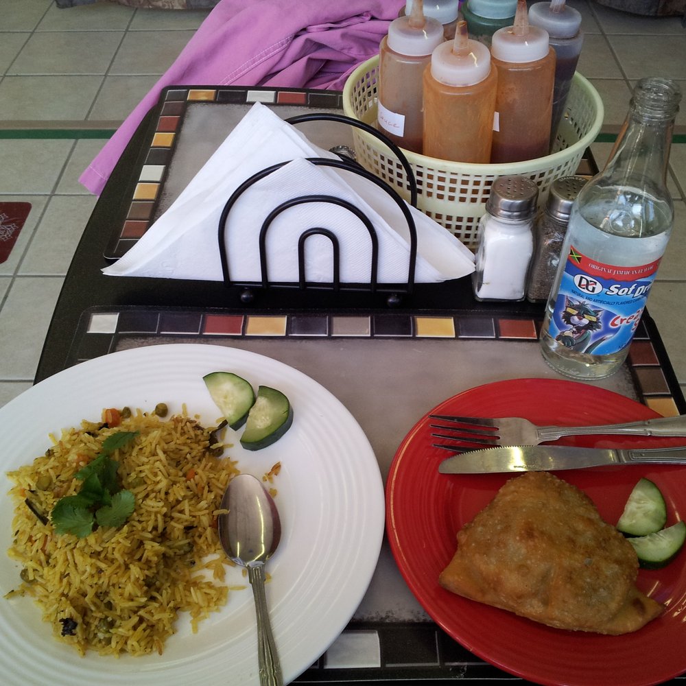 Cosmos Indian Store - Vegetable biryani and a samosa. - Indian Near Me - Lawrence, Kansas Cosmos Indian Store - Vegetable biryani and a samosa. - Indian Near Me - Lawrence, Kansas