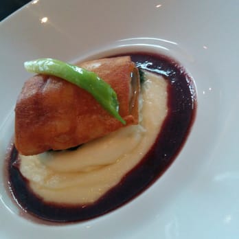 Café Boulud - Sea bass perfectly crisped potatoes on top of potato puree with red wine reduction.so delicious..fish course of 5 course tasting - Cafes Near Me - Toronto, Ontario