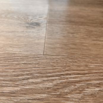 Floor Zone - floor was slid but not replaced/fixed so it still has a raise on the seam. - Flooring Near Me - Raleigh, North Carolina Floor Zone - floor was slid but not replaced/fixed so it still has a raise on the seam. - Flooring Near Me - Raleigh, North Carolina