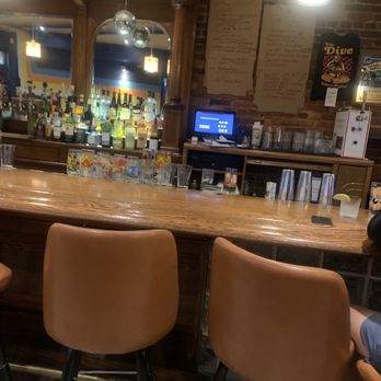 The Dive - Drink menu and themed nights on the wall - Dive Bars Near Me - Baltimore, Maryland