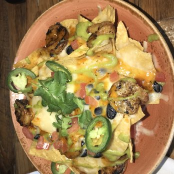 Eureka! - Originally chicken nachos, however pictured are shrimp nachos. Substitutes the chicken. - American Near Me - Austin, Texas Eureka! - Originally chicken nachos, however pictured are shrimp nachos. Substitutes the chicken. - American Near Me - Austin, Texas