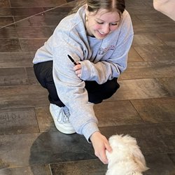 Delta Veterinary Clinic - Team member Maranda loving on a patient.