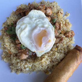 Hughie's - Shaking Chicken Fried Rice with egg and egg roll - Vietnamese Near Me - Houston, Texas Hughie's - Shaking Chicken Fried Rice with egg and egg roll - Vietnamese Near Me - Houston, Texas