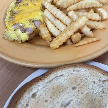 Country Kitchen - Ham and cheese omelette sub fries for country potatoes comes w/side of white bread. - Breakfast & Brunch Near Me - Long Beach, California Country Kitchen - Ham and cheese omelette sub fries for country potatoes comes w/side of white bread. - Breakfast & Brunch Near Me - Long Beach, California