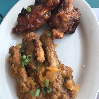 Bon Temps Grill - Swamp legs (duck in mango sauce on bottom and alligator on top) - Cajun/Creole Near Me - Lafayette, Louisiana Bon Temps Grill - Swamp legs (duck in mango sauce on bottom and alligator on top) - Cajun/Creole Near Me - Lafayette, Louisiana