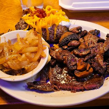 Texas Roadhouse - Fort Worth Ribeye, baked potato, onions on the side - Steakhouses Near Me - Kirkwood, Missouri