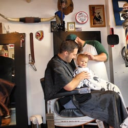 Boling's Barber Shop & Shave Parlor - Titus getting his first haircut by Aaron!