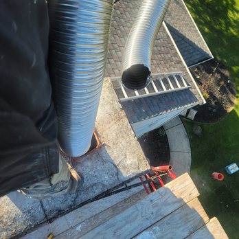 215 Chimney - 7-in liner installation, stainless steel 2-ply 316 TI, And also shows how the crown looked prior to the rebuild and the flu tile before new. - Chimney Sweeps Near Me