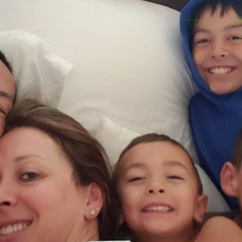 East Zion Resort - Morning family pic in the crazy soft bedding - Resorts Near Me - Orderville, Utah