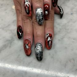 Kevin @ CEO Nails is AMAZING!  No stickers, no air brushing, he does it all freehand.  Here are my Halloween inspired nails.
