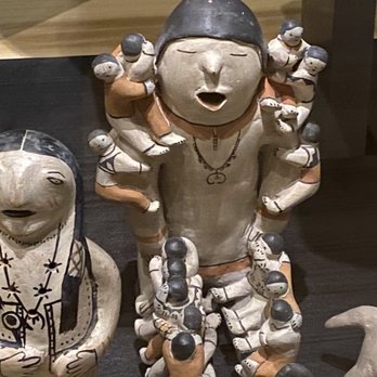 Heard Museum - Storyteller figurine depicting their practice of sharing experiences, culture to the next generation. - Museums Near Me - Phoenix, Arizona Heard Museum - Storyteller figurine depicting their practice of sharing experiences, culture to the next generation. - Museums Near Me - Phoenix, Arizona