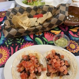 2 Al pastor tacos (no onion or cilantro, sorry I have the gene), chips and salsa, bean and cheese burrito