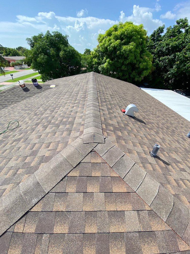 Slide of JMR Roofing Services