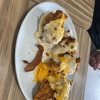 @ The Diner - Chicken, biscuits and gravy w/cheese and bacon - Breakfast & Brunch Near Me - Orlando, Florida
