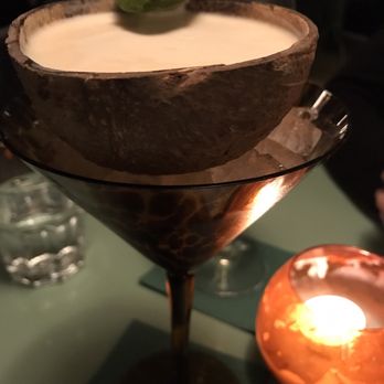 Tropical - Tropic Thunder - great creamy cocktail served in a coconut shell. - Cocktail Bars Near Me - Barcelona, B Tropical - Tropic Thunder - great creamy cocktail served in a coconut shell. - Cocktail Bars Near Me - Barcelona, B