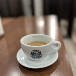 Monopol Cafe - Americano with milk.
