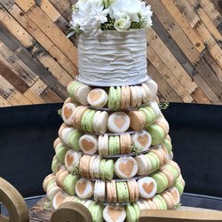 SWEET by Alfie - French macaron wedding display with cake on top