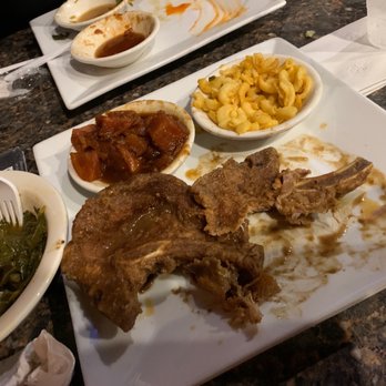 Slade's Bar & Grill - Smothered pork chop dinner & a side of collard greens - Bars Near Me - Roxbury Crossing, Massachusetts Slade's Bar & Grill - Smothered pork chop dinner & a side of collard greens - Bars Near Me - Roxbury Crossing, Massachusetts