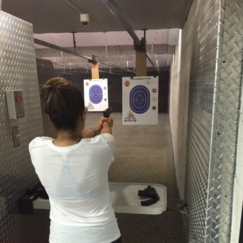 Florida Gun Center Indoor Shooting Range - Shooting the 9mm Sig Sauer - Gun/Rifle Ranges Near Me - Hialeah, Florida Florida Gun Center Indoor Shooting Range - Shooting the 9mm Sig Sauer - Gun/Rifle Ranges Near Me - Hialeah, Florida