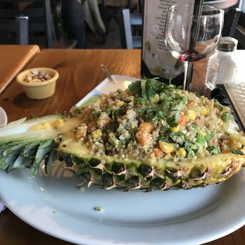 Riko - This awesome vegan quinoa and vegetable stuffed in pineapple dish was suggested by my very attentive waiter. Delicious! - Peruvian Near Me - Sunnyside, New York Riko - This awesome vegan quinoa and vegetable stuffed in pineapple dish was suggested by my very attentive waiter. Delicious! - Peruvian Near Me - Sunnyside, New York