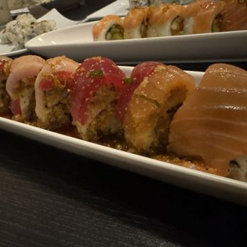 Sushi Fever - Something Wrong Roll Inside: Tempura spicy soft shell crab Top: Tuna, salmon, yellowtail Spicy ponzu sauce - Japanese Near Me - Cedar Park, Texas Sushi Fever - Something Wrong Roll Inside: Tempura spicy soft shell crab Top: Tuna, salmon, yellowtail Spicy ponzu sauce - Japanese Near Me - Cedar Park, Texas