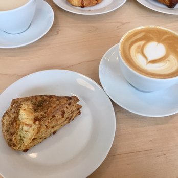 Fluffy Duck Cafe - Savory scone with cheese and caramelized onions and local honey latte. - Cafes Near Me - Cleveland, Ohio Fluffy Duck Cafe - Savory scone with cheese and caramelized onions and local honey latte. - Cafes Near Me - Cleveland, Ohio