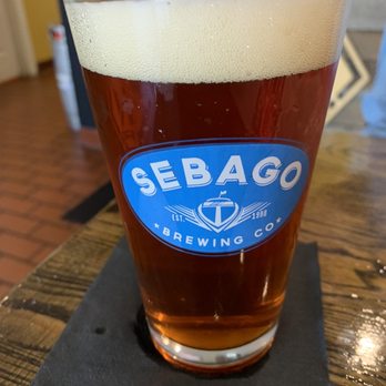 Noble Barbecue - a glass of beer on a coaster - Barbeque Near Me - Portland, Maine Noble Barbecue - a glass of beer on a coaster - Barbeque Near Me - Portland, Maine